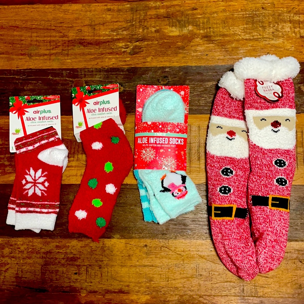 4 pairs of Christmas fuzzy socks.